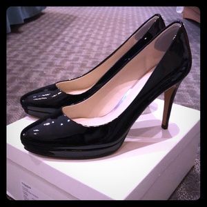 Coach black patent leather pumps